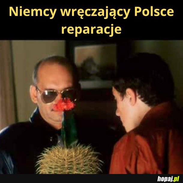 Niemcy wręczający Polsce reparacje